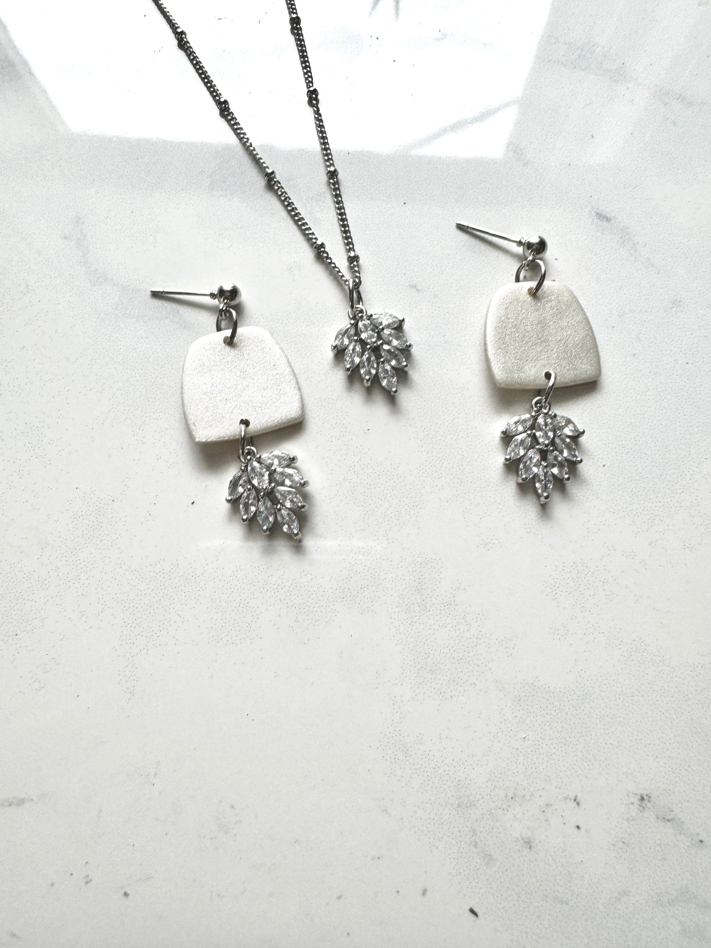 Simple Elegance 
Silver and Pearl Bridal Set